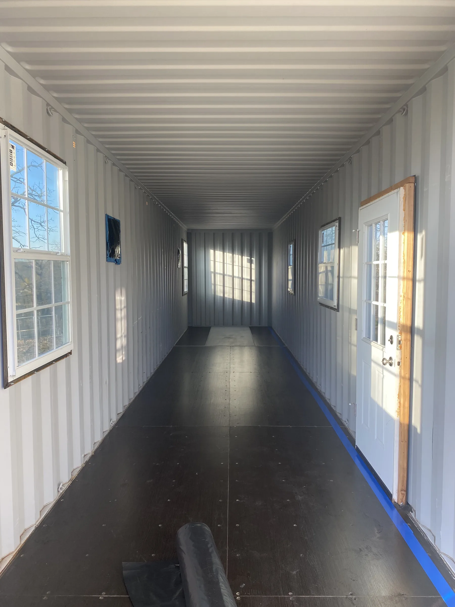 Alvarado cargo-container tiny home before closed-cell spray foam finish