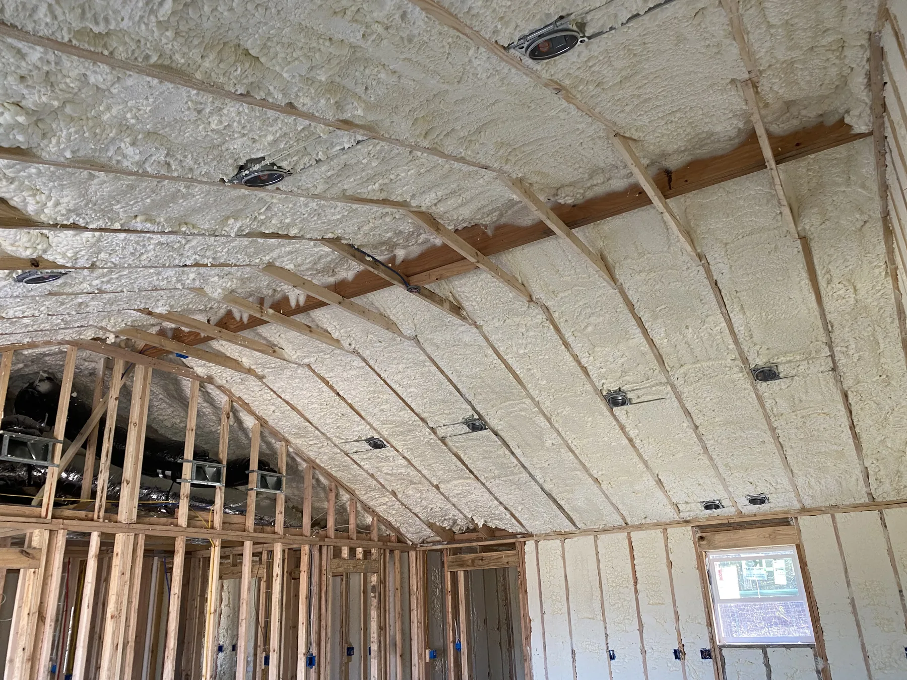 Blum new-home roofline after open-cell spray foam