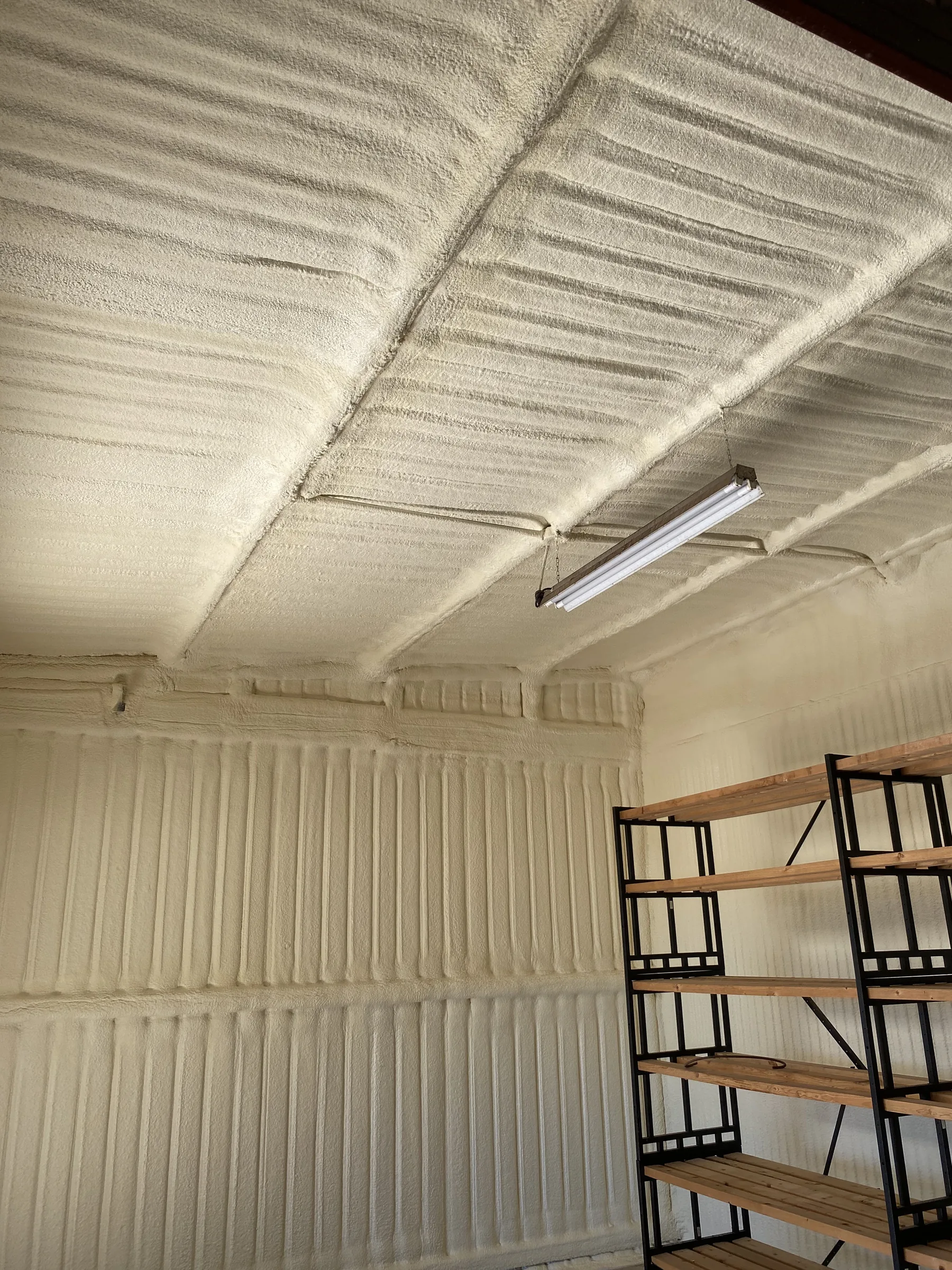Brazos Point ranch storage building after closed-cell spray foam
