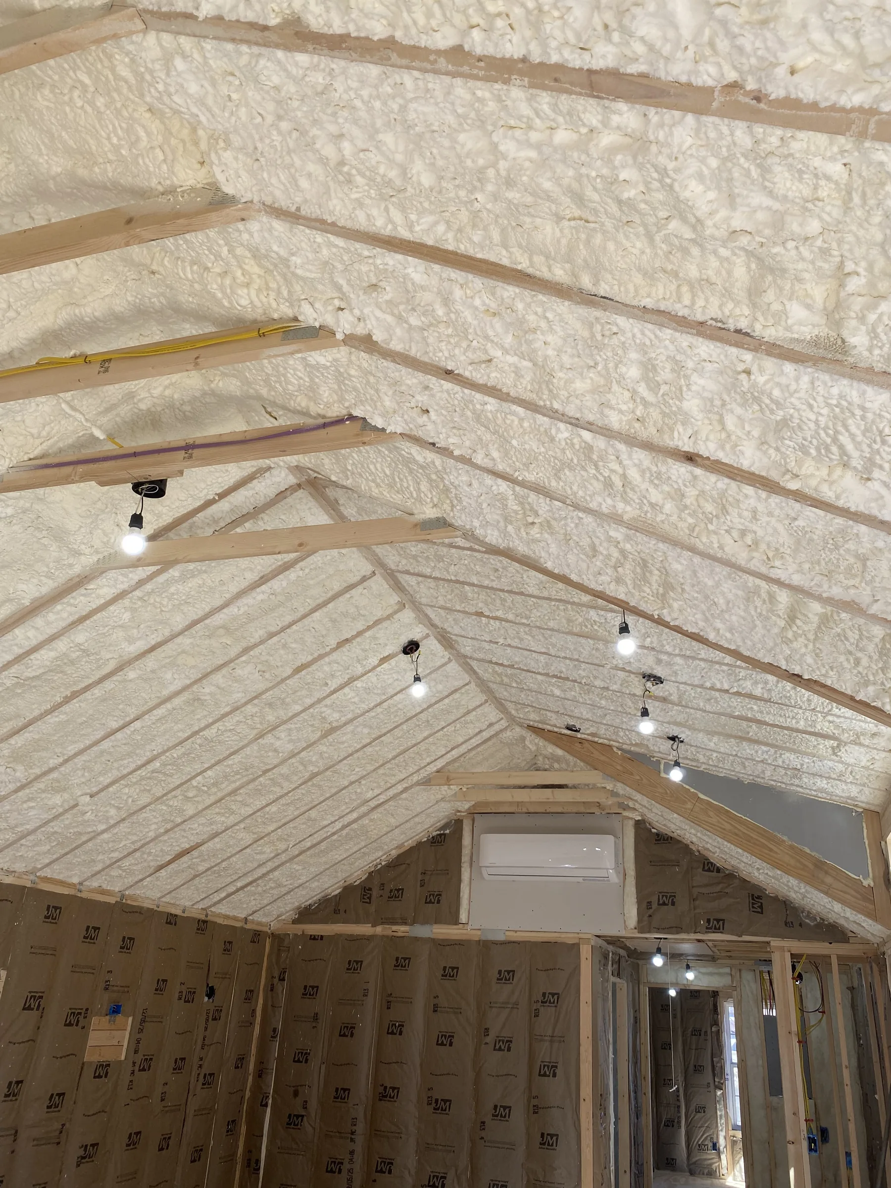 Rio Vista tiny-home roofline after open-cell spray foam